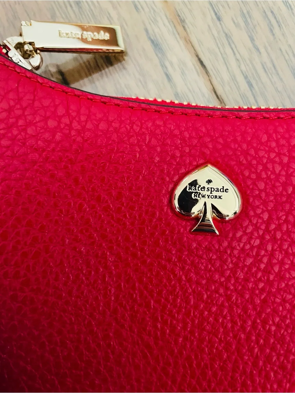 kate spade Red Pebbled Leather Saddle Crossbody with Gold Accent